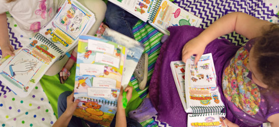 Children reading work books