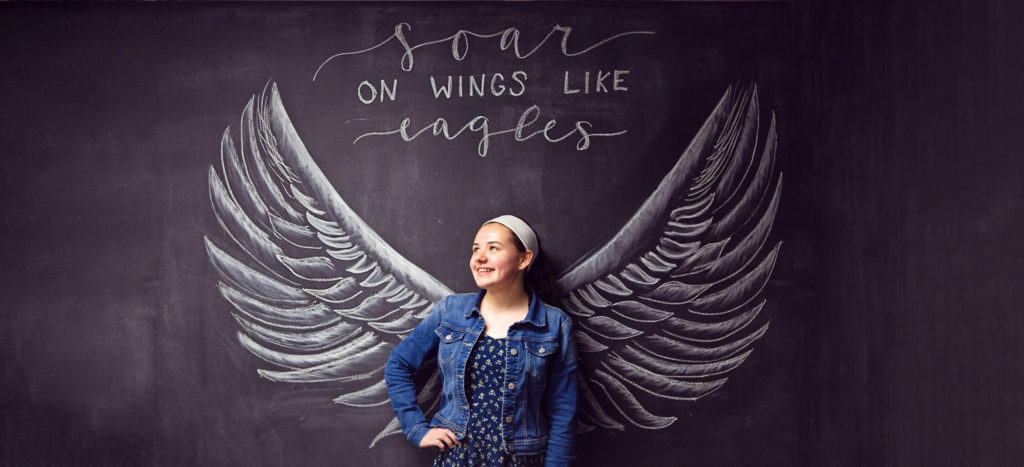 Chalk board drawing soar on wings like eagles